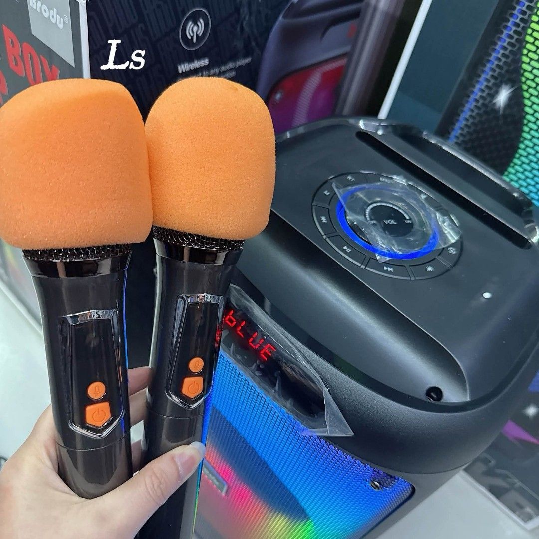 Brodu BTS-2102 Karaoke Box Speaker with 2 Microphones (Category: Soundbars, Speakers & Amplifiers) located in Manila. Submitted by chaionlineshop (Listing ID 1456508914, Image 3). Description: - Karaoke Speaker Model: BTS-2102 - Features vibrant RGB lighting - Includes two microphones - Comes with a charging cable - Wireless connectivity via Bluetooth - Ideal for parties and singing sessions - Easy to use: lights up and plays music.