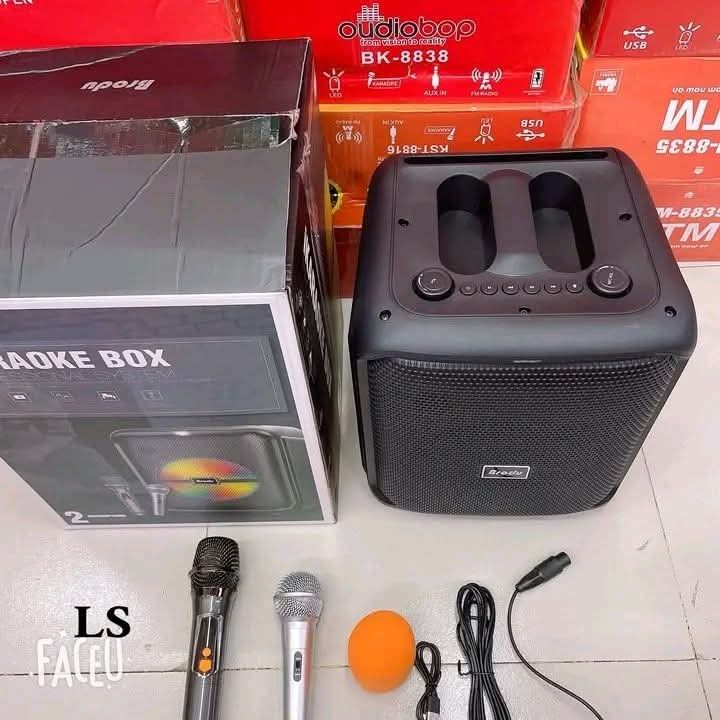 Brody BTS-1740 iKaraoke Box Bluetooth Speaker with 2 Mics (Category: Soundbars, Speakers & Amplifiers) located in Manila. Submitted by chaionlineshop (Listing ID 1456504164, Image 3). Description: - Portable iKaraoke Box with Bluetooth - Includes 2 microphones (1 wireless, 1 wired) - Comes with an orange mic cover - Features LED lights on the speaker - Connects via AUX and FM Radio - Rechargeable via USB - Ideal for parties and singing sessions.