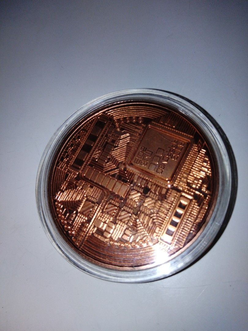 Bronze Bitcoin (Category: Currency) located in Singapore. Submitted by brightcat.fce498 (Listing ID 1456489621, Image 1). Description: - Bronze Bitcoin coin - Features intricate circuit board design - Iconic Bitcoin logo visible - Great for collectors and crypto enthusiasts - Meetup available at Blk 986C Buangkok Crescent.
