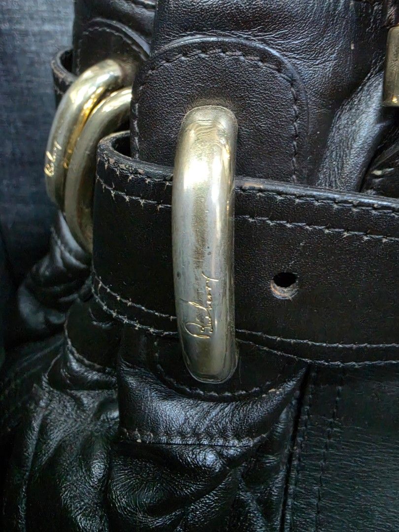 Burberry Quilted Leather Tote Bag (Category: Luxury Bags & Wallets) located in General Trias. Submitted by roselle2230 (Listing ID 1456544233, Image 3). Description: - Authentic Black Burberry tote bag - Luxurious quilted leather with elegant gold-tone hardware - Adjustable straps with stylish buckle details - Signature green interior lining - Proudly 'Made in Italy' - A timeless and versatile piece for your daily essentials.