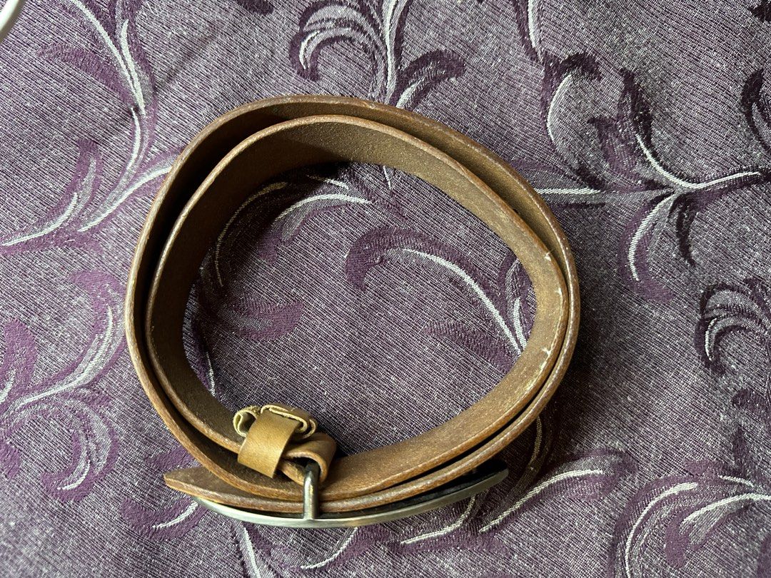 Calvin Klein Jeans Leather Belt Brown (Category: Belts) located in Silang. Submitted by ws.thrift (Listing ID 1456474688, Image 2). Description: Details ⬇️ Price: ₱899 Calvin Klein Jeans Leather Belt Brown Classic brown leather belt featuring a signature Calvin Klein Jeans silver-toned buckle with a clean vintage-inspired design. Adjustable with multiple belt holes. Size: Fits approx. W32–W36 Condition: 8/10 Color rate: 8/10 Issue(s): Minor scrat