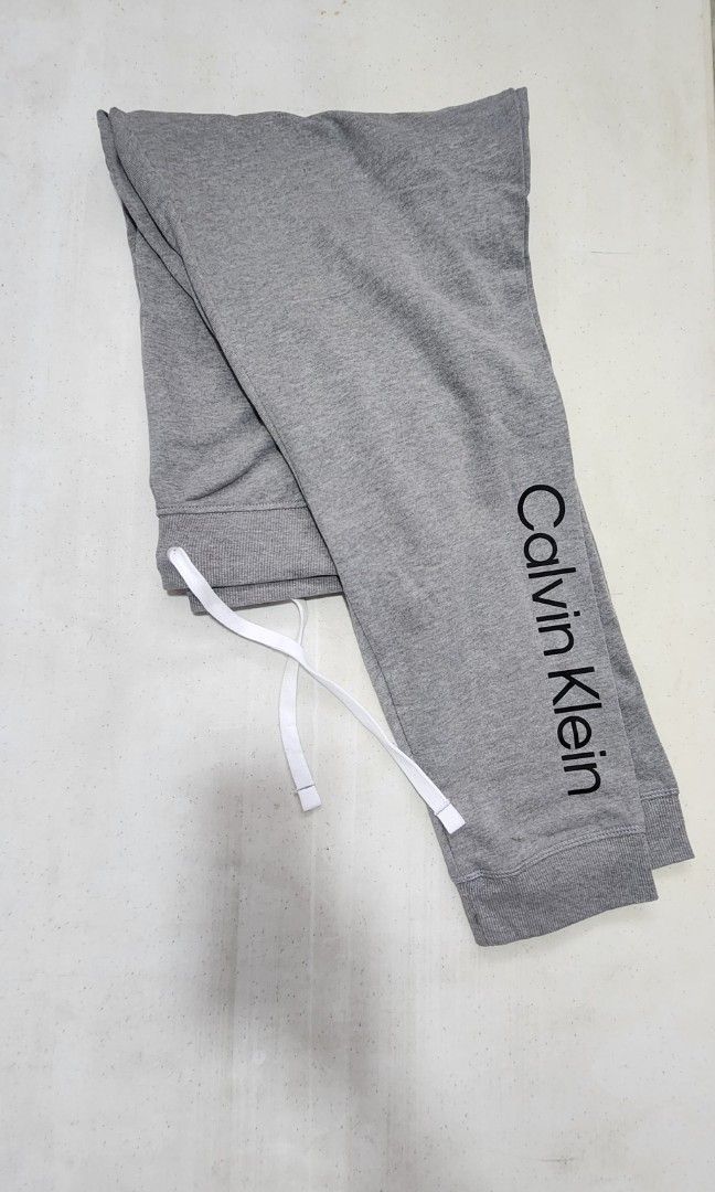 Calvin Klein jogger pants (Category: Activewear) located in Caloocan City. Submitted by celonessentials (Listing ID 1456512377, Image 2). Description: Brand new with tag,bought in Australia for P2K. selling low, as it does not fit my aon.