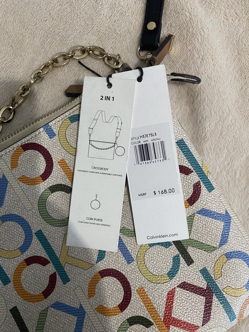 Calvin Klein Multicolor Rainbow Monogram Crossbody Bag (Category: Luxury Bags & Wallets) located in Davao. Submitted by sweeetooth10 (Listing ID 1456463713, Image 2). Description: Calvin Klein Multicolor Rainbow Monogram Crossbody Bag Used once, still has its tag Pm for more deets.