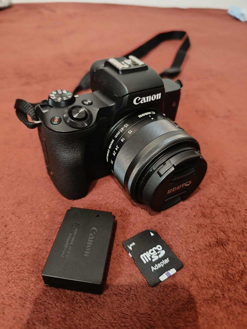Canon EOS M50 Mirrorless Camera with Hollyland Wireless Mics (Category: Cameras) located in Roxas. Submitted by trenzui (Listing ID 1456438246, Image 2). Description: ALL IN. including hollyland mic. - Canon EOS M50 Camera - 15-45mm Lens - Battery, Charger, Strap, Lens Cap - Hollyland Wireless Microphone Set (Transmitters, Receiver, Charging Case, Adapters) Binebenta ko kasi need ko ng pera papuntang ibang bansa Itong camera na ito, hindi ko naga
