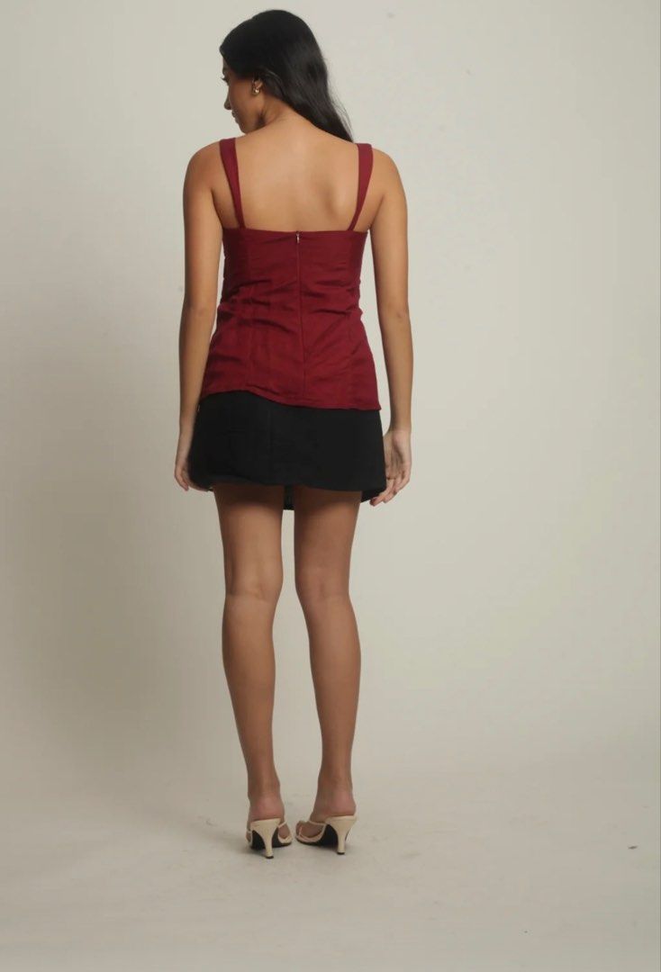 Carino Mina Maroon Spaghetti Strap Tank Top (Category: Sleeveless) located in Baguio. Submitted by closetonsail (Listing ID 1456450744, Image 3). Description: - Originally bought for ₱1,650 - Please check the size chart for accurate measurements - Not my style anymore; brand new W/O tag; never worn! - Tags: HM, Mango, Bershka, Araw, Zara, Carino, Uniqlo.