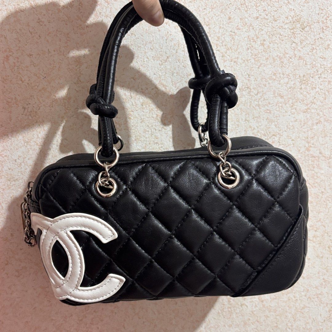 chanel cambon 1nsp0 top handle bag (Category: Luxury Bags & Wallets) located in Las Pinas. Submitted by totesarchive (Listing ID 1456562856, Image 1). Description: no more last price pls! flaws r on the lining, still usable & not obvious at all since its in the very top very nice outside, holds its structure well :) w holo sticker bought here also in carousell w the same issue but i still use it too.