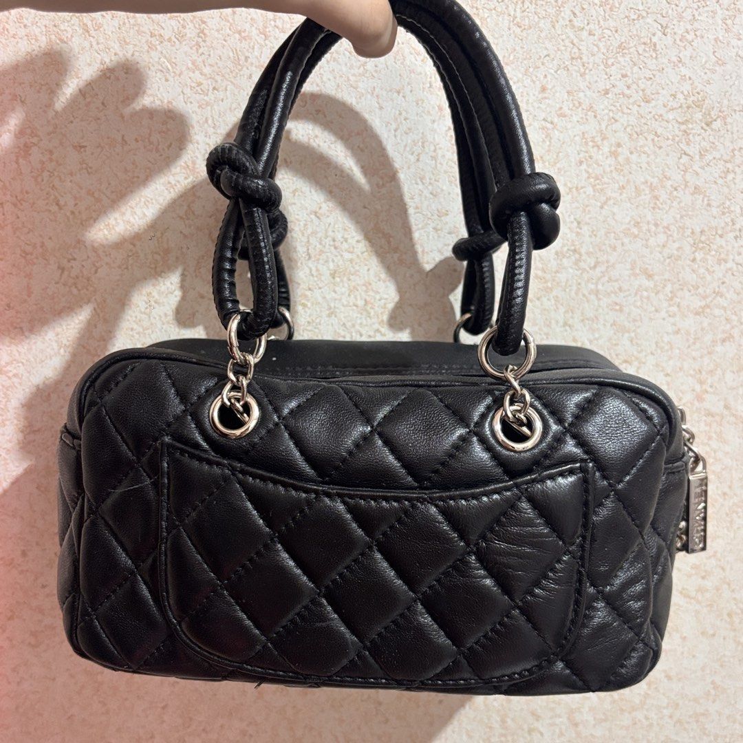 chanel cambon 1nsp0 top handle bag (Category: Luxury Bags & Wallets) located in Las Pinas. Submitted by totesarchive (Listing ID 1456562856, Image 3). Description: no more last price pls! flaws r on the lining, still usable & not obvious at all since its in the very top very nice outside, holds its structure well :) w holo sticker bought here also in carousell w the same issue but i still use it too.