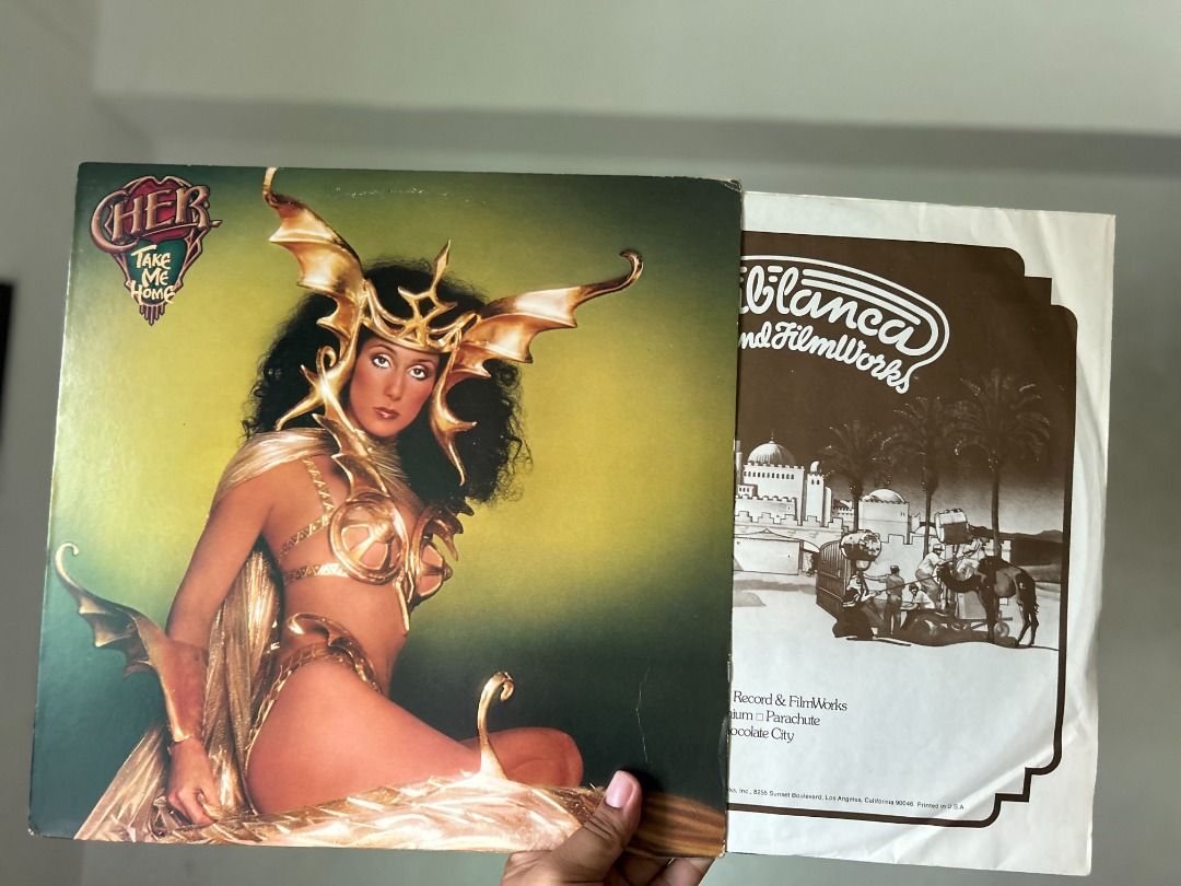 Cher Take Me Home Vinyl Record (Category: Vinyls) located in Mandaluyong City. Submitted by markiecart (Listing ID 1456011362, Image 3). Description: - Cher's 'Take Me Home' vinyl record - A classic album for any Cher fan - Great addition to your vinyl collection - Album cover is in a protective plastic sleeve.