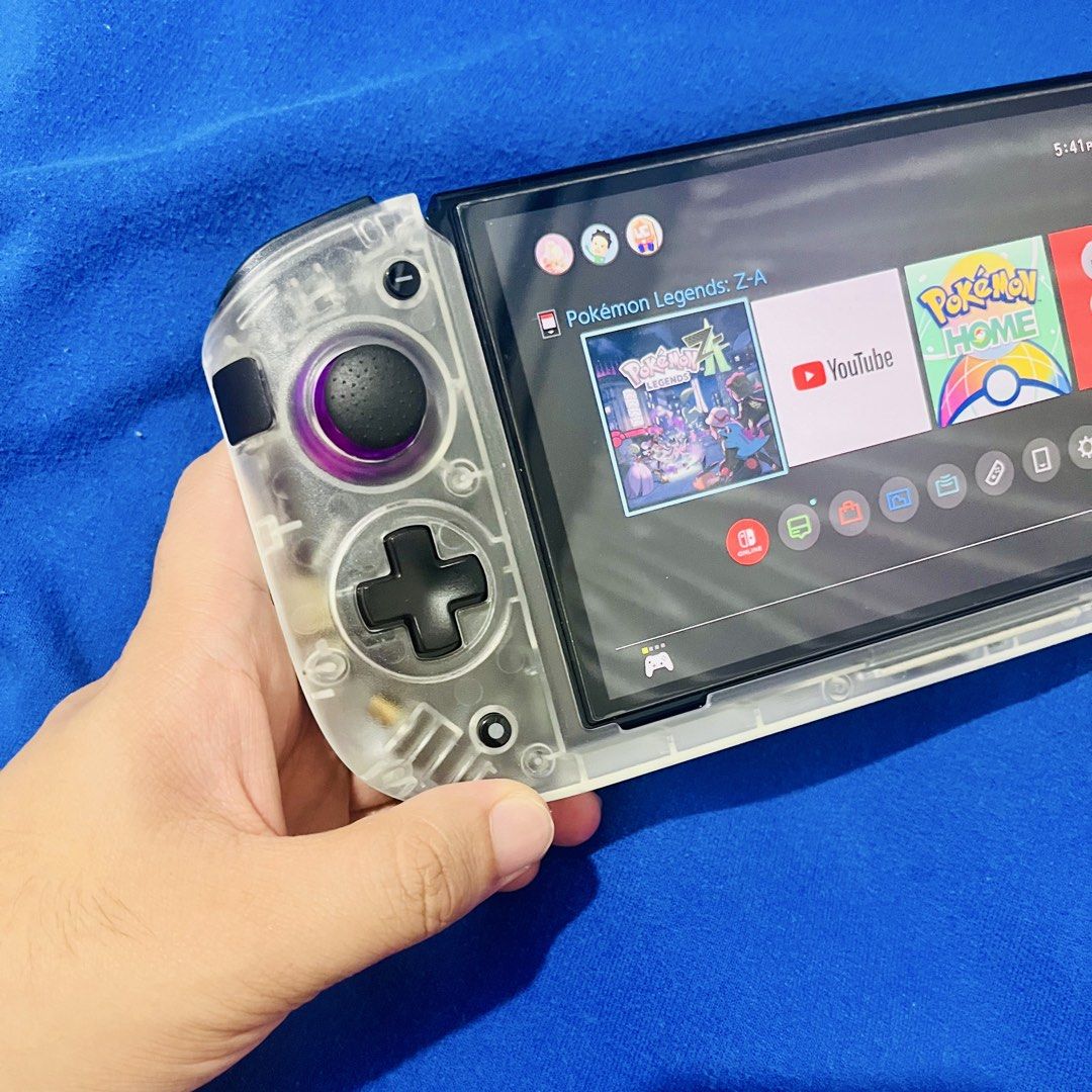 CRKD Nitro Deck Controller for Switch OLED (Category: Controllers) located in Calamba. Submitted by papermilkbooksk (Listing ID 1456513813, Image 2). Description: with receipt. kakarating and unbox lang from amazon. masyado pala malaki sa kamay ko. includes hdmi adapter. working naman lahat. Clear white version CKRD Nitro Deck Controller for Switch OLED.