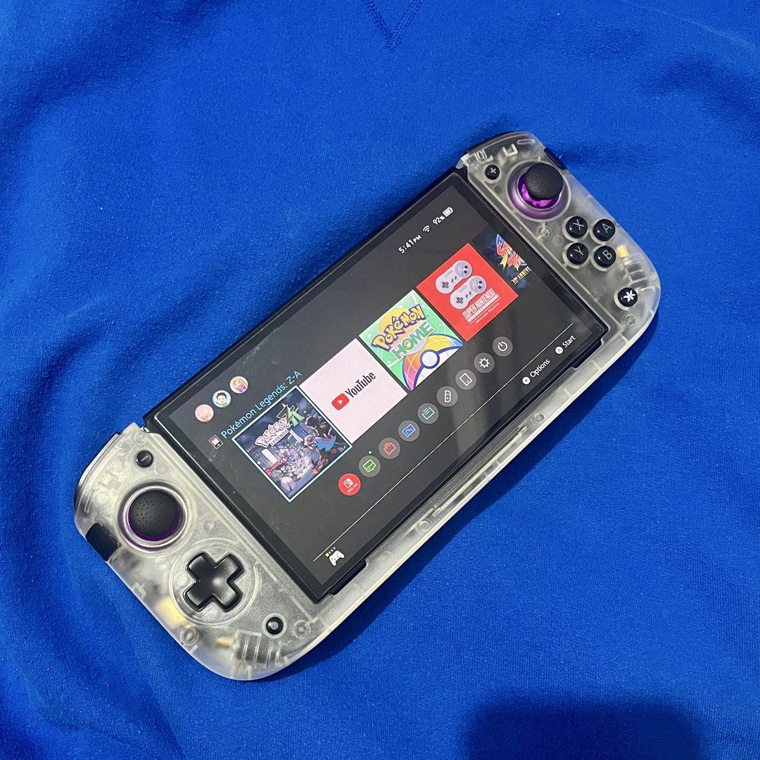 CRKD Nitro Deck Controller for Switch OLED (Category: Controllers) located in Calamba. Submitted by papermilkbooksk (Listing ID 1456513813, Image 3). Description: with receipt. kakarating and unbox lang from amazon. masyado pala malaki sa kamay ko. includes hdmi adapter. working naman lahat. Clear white version CKRD Nitro Deck Controller for Switch OLED.