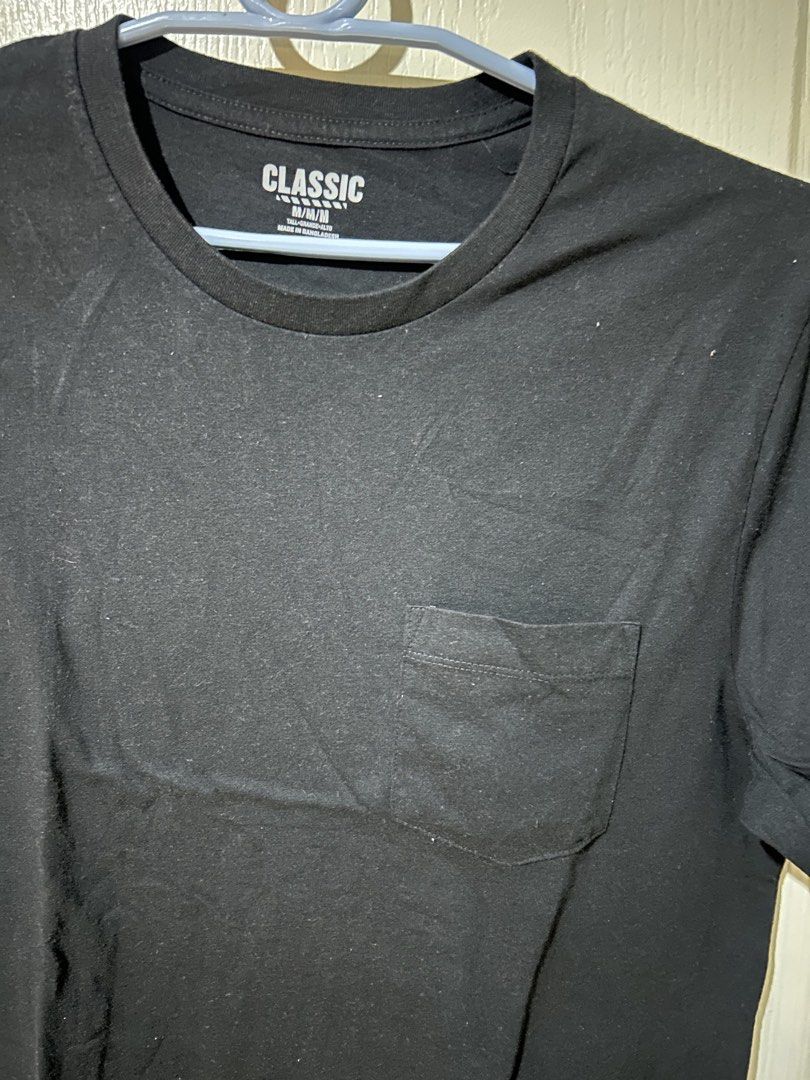 Classic Black Pocket T-Shirt Size M (Category: Tshirts & Polo Shirts ) located in Manila. Submitted by dal527 (Listing ID 1456589532, Image 2). Description: - Classic black t-shirt - Size: Medium (M) - Chest pocket detail - Made in Bangladesh - Versatile for everyday wear.