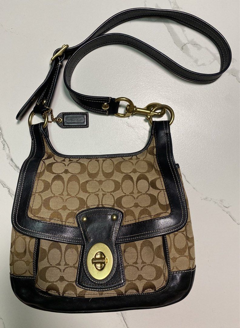 Coach Legacy (Category: Luxury Bags & Wallets) located in Balagtas. Submitted by dadalalashop (Listing ID 1456590329, Image 1). Description: - Classic Coach shoulder bag - Signature C canvas with black leather trim - Secure turn-lock closure - Colorful striped interior lining - Adjustable shoulder strap - Ideal for everyday use.
