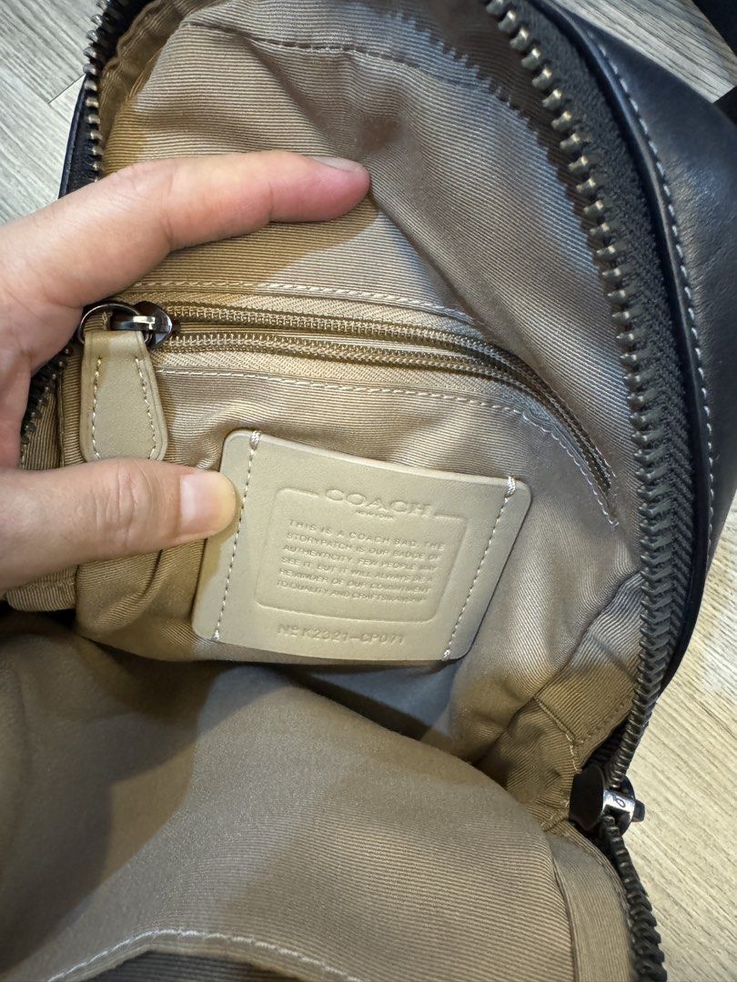 Coach Signature C Monogram Sling Bag (Category: Luxury Bags & Wallets) located in Pandi. Submitted by goryo.1986 (Listing ID 1456464588, Image 3). Description: ONLY USED TWICE 6,900 to 4,900 no more tawad - Authentic Coach sling bag - Signature C monogram print - Black leather trim - Secure zipper closure - Adjustable strap for comfortable wear - Breathable black mesh back - Interior zip pocket and slip pocket - Coach Sulivan pack in Signature Ca