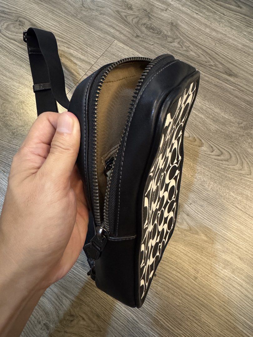 Coach Signature C Monogram Sling Bag (Category: Luxury Bags & Wallets) located in Pandi. Submitted by goryo.1986 (Listing ID 1456464588, Image 2). Description: ONLY USED TWICE 6,900 to 4,900 no more tawad - Authentic Coach sling bag - Signature C monogram print - Black leather trim - Secure zipper closure - Adjustable strap for comfortable wear - Breathable black mesh back - Interior zip pocket and slip pocket - Coach Sulivan pack in Signature Ca