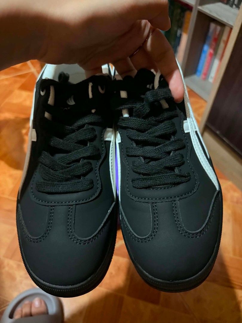 Corolla Black and White Sneakers Size 37 (Category: Sneakers) located in Marilao. Submitted by 90schicc (Listing ID 1456504779, Image 3). Description: Black Corolla sneakers, size 37 (235mm), with white accents and platform sole. Lace-up. Comes with original box. Perfect for casual wear. **NEVER USED, JUST TRIED ON** **NO FLAWS** comes with the orig box - box with slight damage. See photo. Orig price 930 (black app) last price posted. No haggling