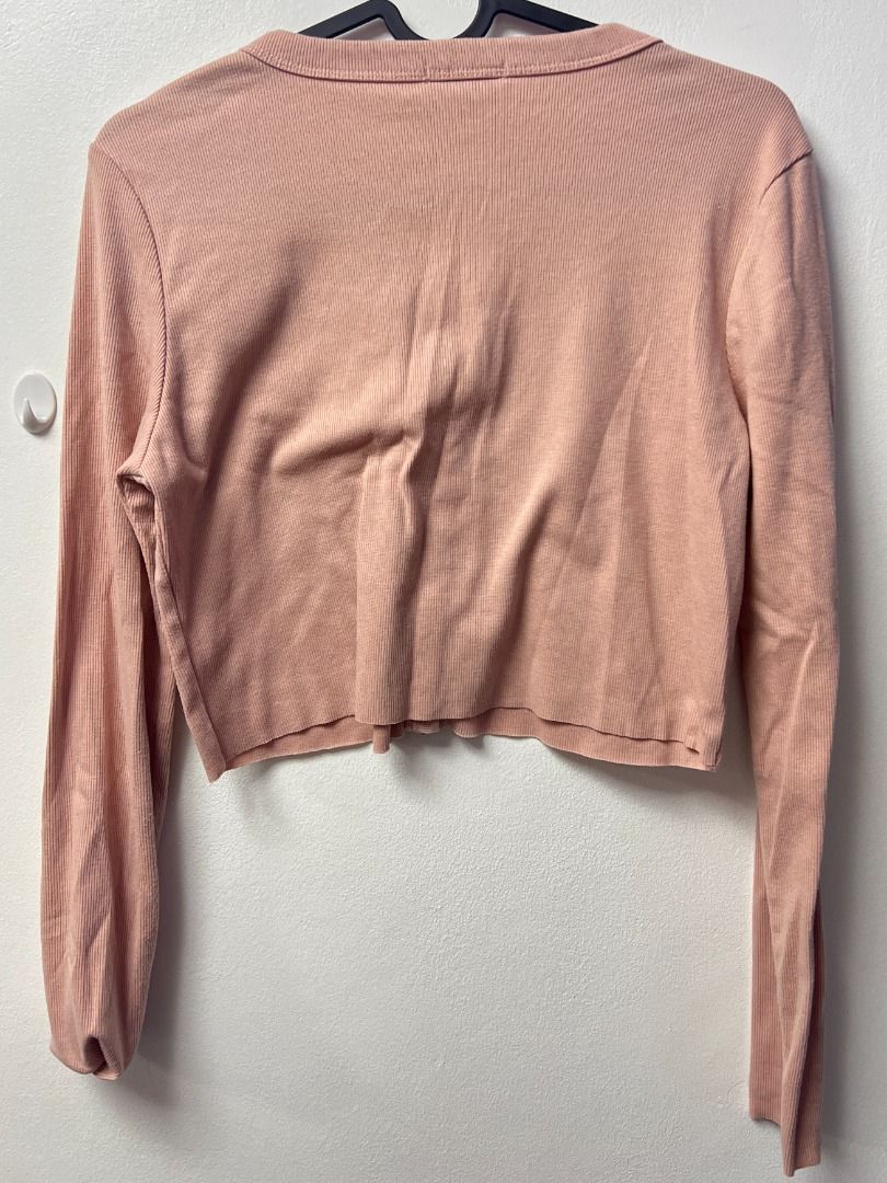 Cotton On Pink Cropped Cardigan (Category: Shirts) located in Pasig City. Submitted by sqfund (Listing ID 1456550400, Image 3). Description: ✨Excellent condition✨ - Cropped Cardigan top from Cotton On - Size SMALL - Ribbed texture ____________________________________________________________________ MOP: GCash / BDO Open to reasonable offers for bundled purchases! Feel free to send me a message :>> Items will be checked before shipping; any flaws 