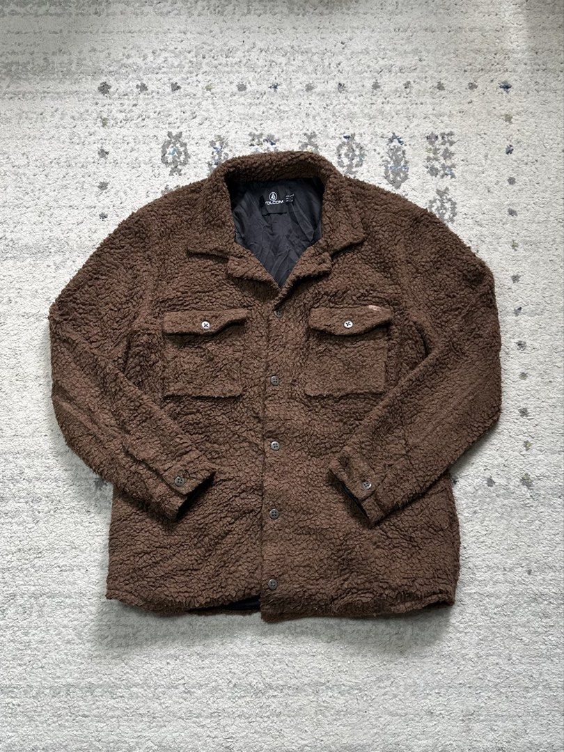 Cozy Volcom Sherpa Fleece Button-Up Jacket (Category: Coats, Jackets and Outerwear) located in Daet. Submitted by thrifthings2018 (Listing ID 1456428361, Image 2). Description: - Super cozy brown Volcom sherpa fleece jacket - Button-up style - Two chest pockets - Quilted lining for extra warmth - Measurements: Width 22 inches, Length 28 inches.