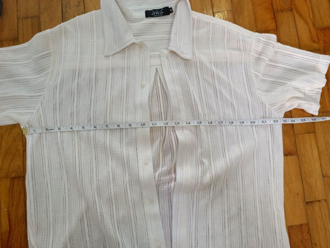 Cream Crochet Short Sleeve Button Up Shirt (Category: Tshirts & Polo Shirts ) located in Quezon City. Submitted by cheecharon (Listing ID 1456432644, Image 3). Description: - Features: Lightweight and breathable - Versatility: Great for layering or wearing on its own. Perfect for casual or beach wear - Bought in Thailand, used 1-2x.