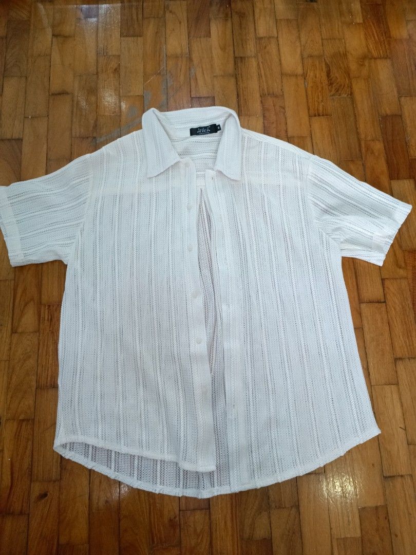 Cream Crochet Short Sleeve Button Up Shirt (Category: Tshirts & Polo Shirts ) located in Quezon City. Submitted by cheecharon (Listing ID 1456432644, Image 1). Description: - Features: Lightweight and breathable - Versatility: Great for layering or wearing on its own. Perfect for casual or beach wear - Bought in Thailand, used 1-2x.