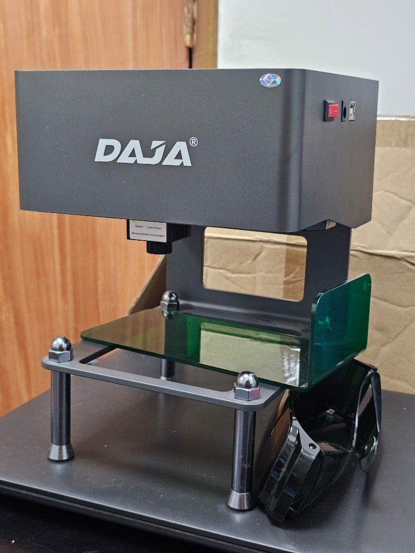 DAJA Laser Engraver Machine with Protective Goggles (Category: Office & Business Technology) located in Paranaque City. Submitted by rhodalietagle (Listing ID 1456528401, Image 3). Description: - DAJA Laser Engraver - Compact and ready for immediate use - Protective goggles included - Ideal for personal projects and small business ventures -with free pencil / pen jig (wooden & 3d) RFS: DI NA NAGAGAMIT. nag focus sa cake topper making and other pr