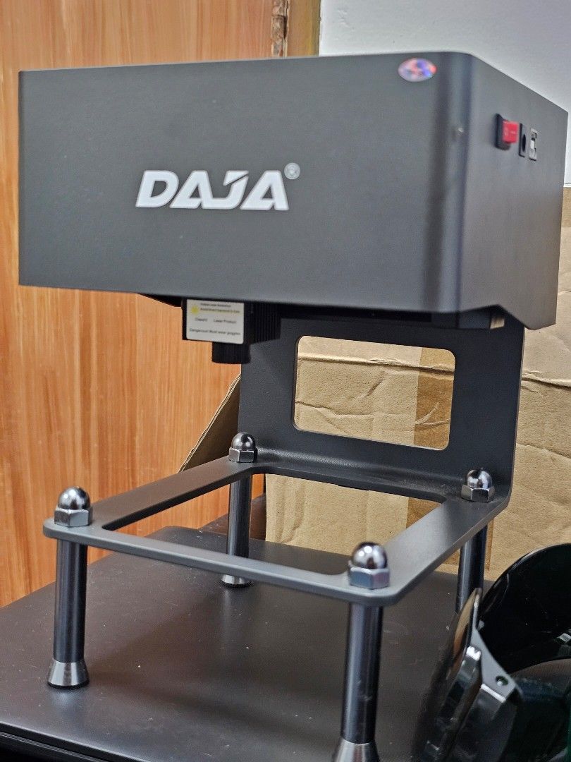 DAJA Laser Engraver Machine with Protective Goggles (Category: Office & Business Technology) located in Paranaque City. Submitted by rhodalietagle (Listing ID 1456528401, Image 1). Description: - DAJA Laser Engraver - Compact and ready for immediate use - Protective goggles included - Ideal for personal projects and small business ventures -with free pencil / pen jig (wooden & 3d) RFS: DI NA NAGAGAMIT. nag focus sa cake topper making and other pr