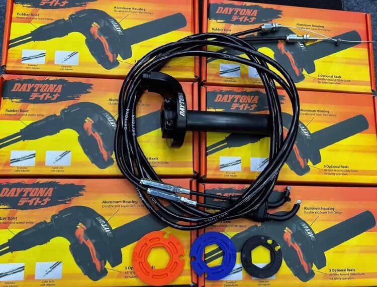 Daytona quick throttle for scooter (Category: Other Motorcycles Parts and Accessories) located in Cabuyao City. Submitted by reyesmcrey21582 (Listing ID 1456470924, Image 2). Description: - Daytona quick throttle for scooter - Includes throttle housing, cables, and 3 optional reels (orange, blue, black). - Durable aluminum housing. - Water-resistant rubber boot. - All parts neatly packaged..