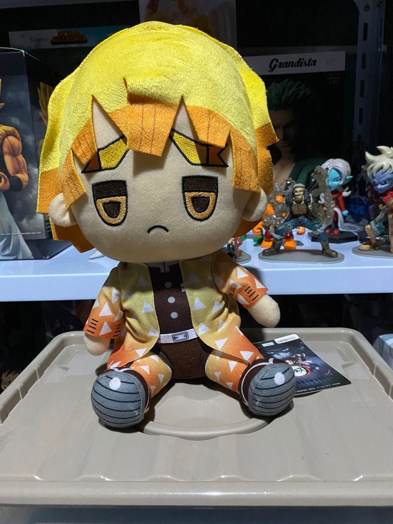 Demon Slayer Zenitsu Agatsuma Plush Toy (Category: Plushies & Soft Toys) located in Caloocan City. Submitted by rickki_t (Listing ID 1456514747, Image 1). Description: - Demon Slayer Zenitsu Agatsuma plush toy - Features iconic yellow hair with orange accents - Wears his signature yellow and orange patterned haori - Adorable sleepy expression - A must-have for any anime fan's collection - Comes with original tag.