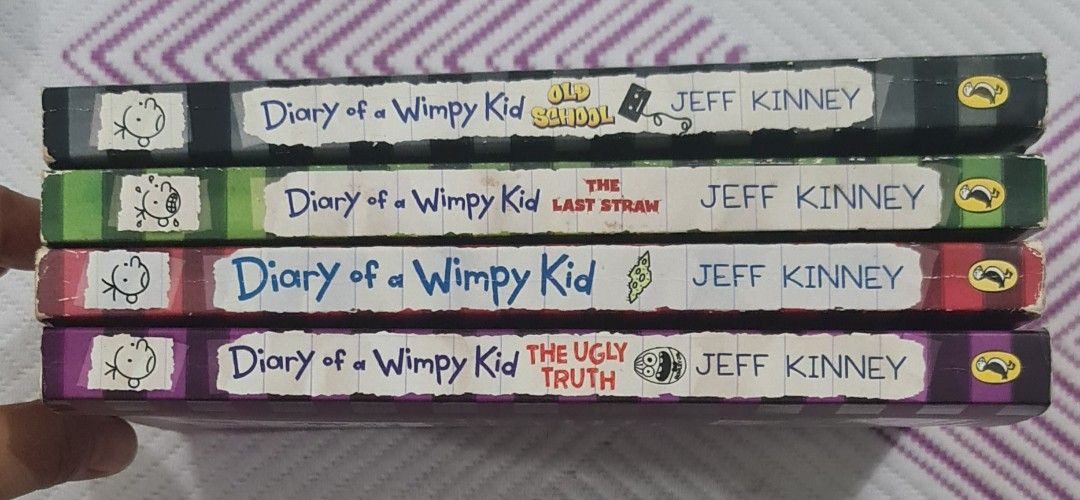 Diary of a Wimpy Kid Book Set - Paper Back (Category: Children's Books) located in Manila. Submitted by eithne128 (Listing ID 1456423681, Image 2). Description: - Set of 4 Diary of a Wimpy Kid books - Titles included: The Ugly Truth, Cabin Fever, Old School, The Last Straw - Perfect for young readers - Features humorous and relatable stories - International bestsellers.