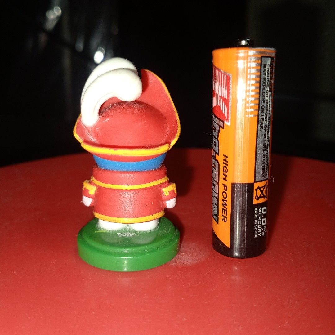 Doraemon Pirate Figure Toy (Category: Figurines & Statues) located in Binan City. Submitted by kaithrifting (Listing ID 1456517689, Image 2). Description: - Adorable Doraemon figure dressed as a pirate. - Comes with a green display base. - Small collectible toy, ideal for fans and collectors. - Perfect for displaying on shelves or desks..
