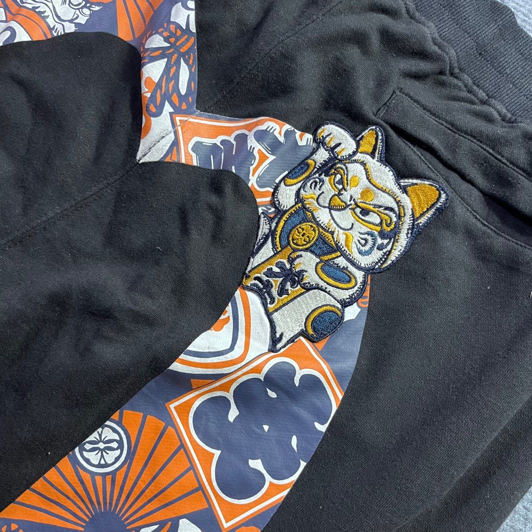 EVISU DAICOCK (Category: Joggers) located in Panabo. Submitted by bae.sick_thirft (Listing ID 1456567145, Image 2). Description: EVISU DARUMA PATTERN DAICOCK‼️ • Condition - Excellent • Issue - None • Color rate - 9.2/10 • Fave Dimes : Waist - Adjustable (with lace) Lenght - 40 Leg op - 6 Thigh - 14 BID AT YOUR OWN RISK FLAKERS WILL BE POSTED⚠️.