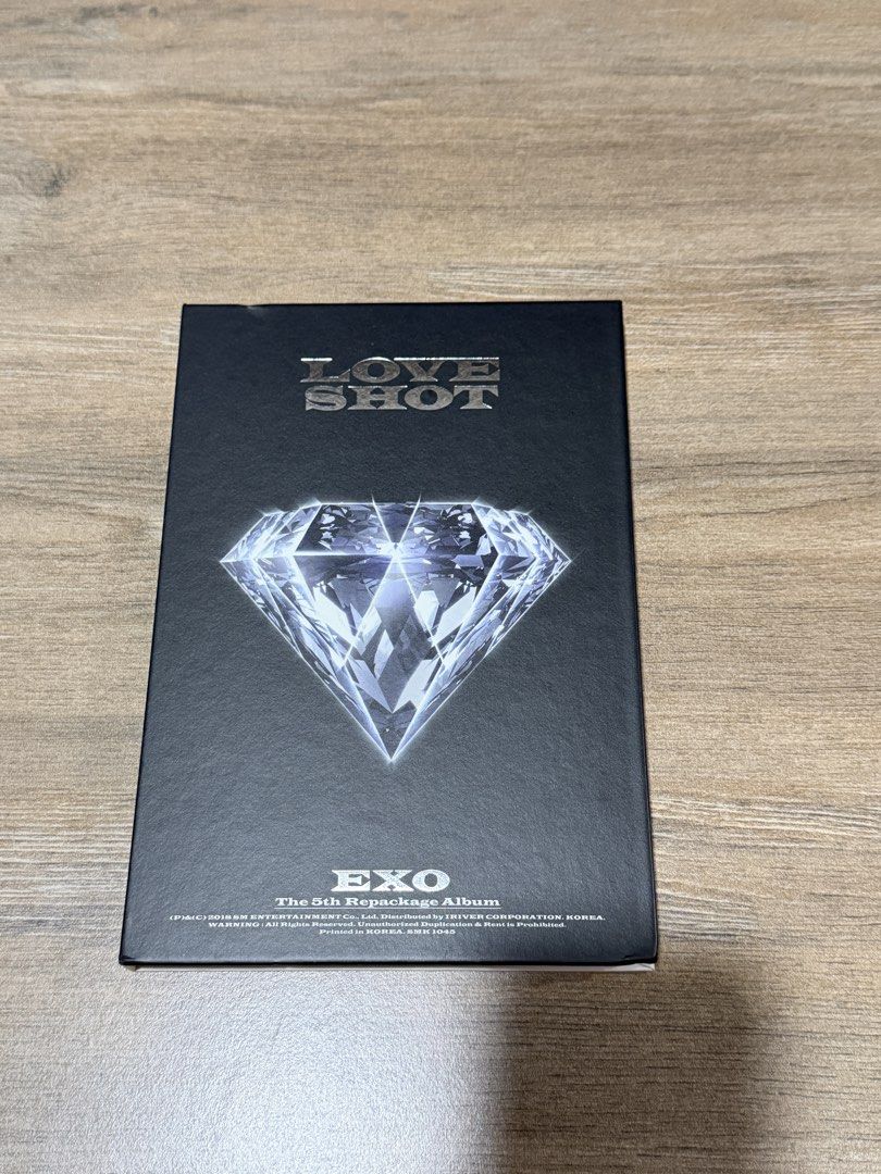 Exo Love Shot, Love Version Album (Category: CDs & DVDs) located in Pasig City. Submitted by mendd (Listing ID 1456474105, Image 1). Description: photobook and cd.