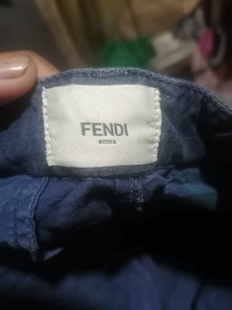 FENDI (Category: Chinos) located in San Carlos City. Submitted by apyogone (Listing ID 1456511178, Image 3). Description: navy blue Fendi chino trousers feature a clean, straight-leg silhouette with front button detailing and integrated belt loops.
