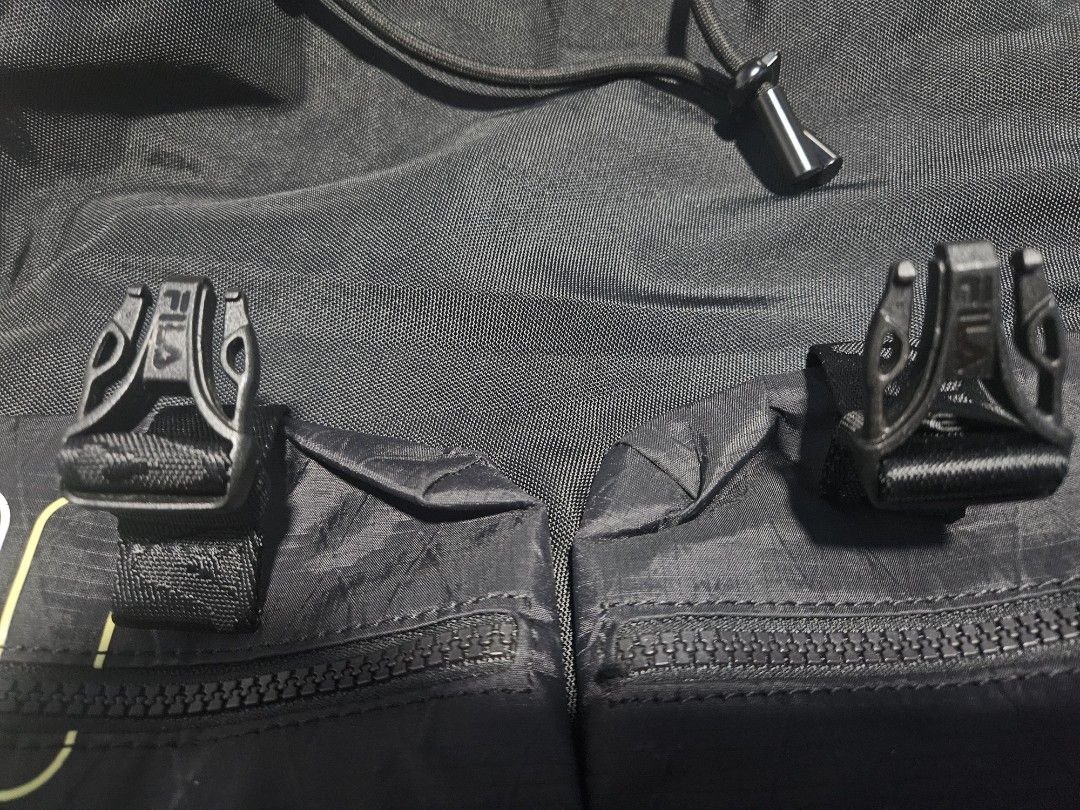 FILA Backpack - Black (Category: Backpacks) located in Manila. Submitted by mistyricst08057 (Listing ID 1456453043, Image 2). Description: - Black Fila backpack - Padded back support for comfort - Fila branded buckles on front pockets - Secure drawstring closure at the top - Ample interior space - Ideal for everyday use and travel.