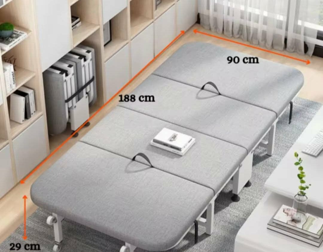 Foldable Guest Bed with Mattress (Category: Bed Frames & Mattresses) located in Mandaluyong City. Submitted by carmy.94 (Listing ID 1456482561, Image 3). Description: - Easy to fold and store, ideal for small spaces or guests. - Comfortable mattress included. - Rolls easily on wheels for convenient movement. - Sturdy metal frame for durability. - Open dimensions: 188cm x 60cm. - Folded dimensions: 60cm x 60cm x 32cm..