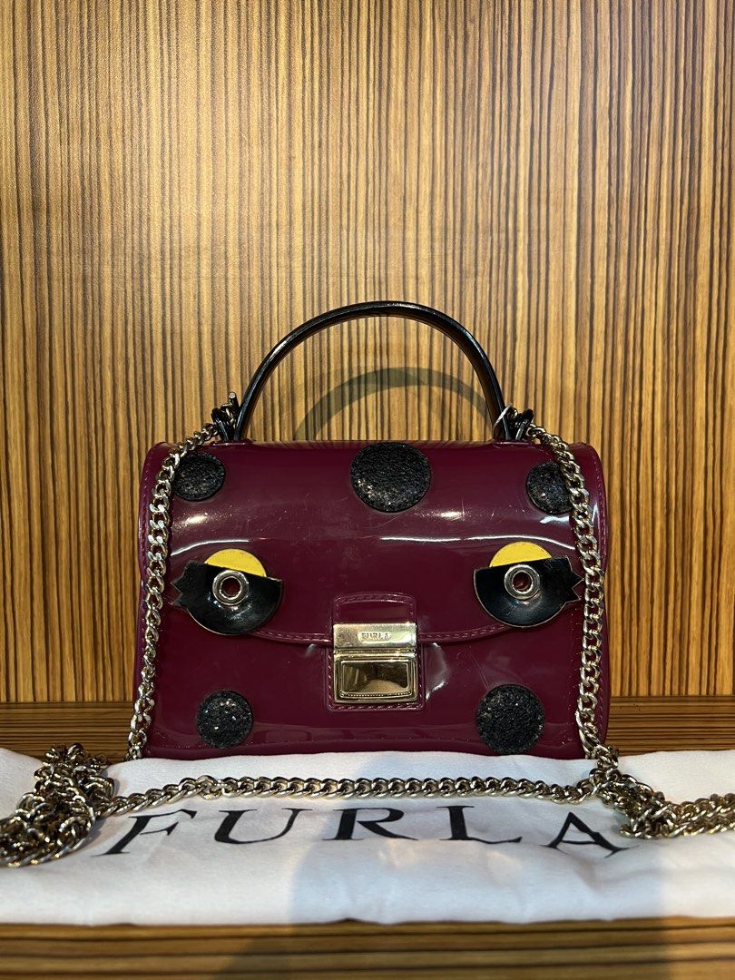 Furla Candy Tweet Sugar mini red bag (Category: Cross-body Bags) located in Quezon City. Submitted by brand.selection (Listing ID 1456543895, Image 1). Description: Candy Tweet Sugar mini red bag.