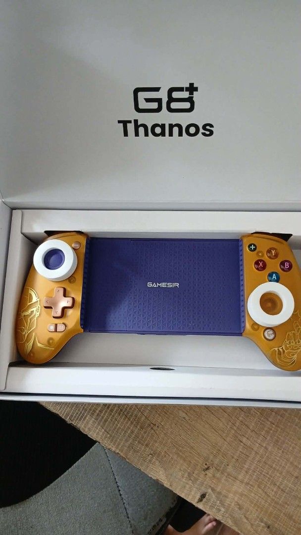 GameSir G8 Thanos Edition Mobile Controller (Category: Controllers) located in Manila. Submitted by chimchimay (Listing ID 1456446982, Image 1). Description: - GameSir G8 Thanos Edition controller - Designed for mobile gaming - Striking gold and purple colorway - Comes in original packaging - Ideal for intense gaming sessions.