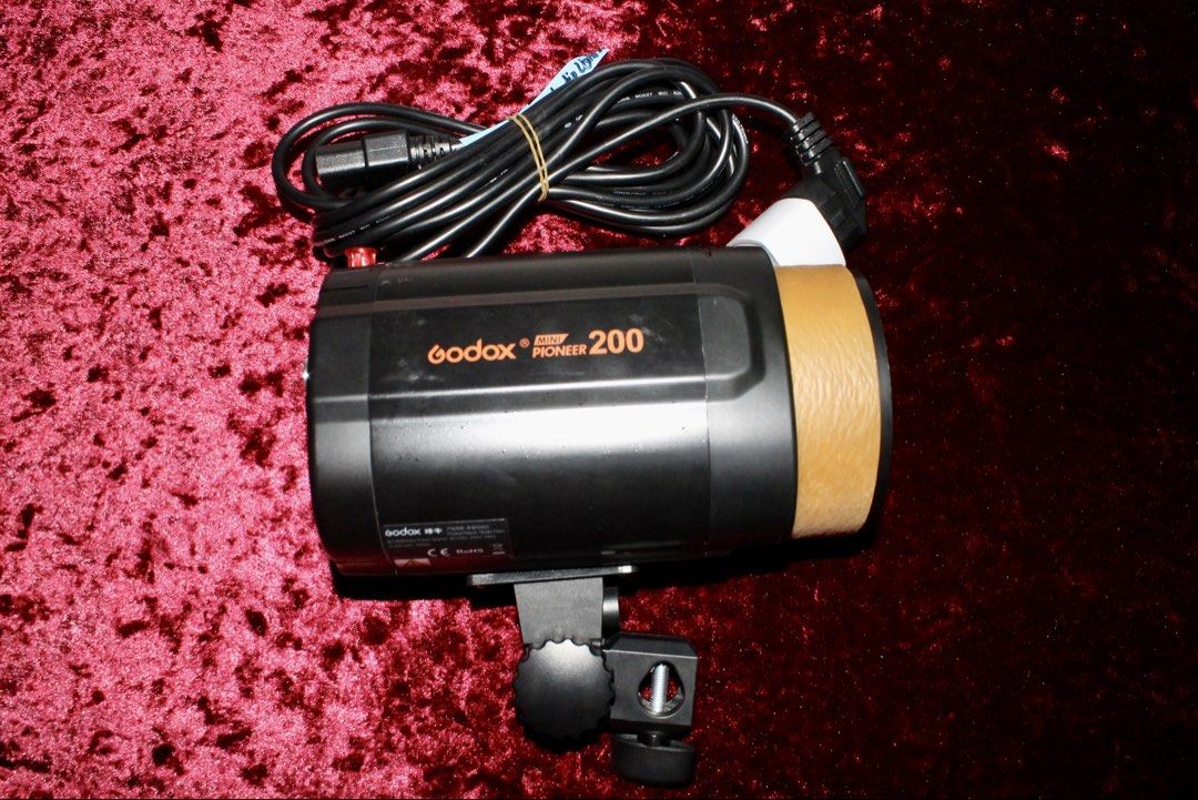 Godox Mini Pioneer 200W Studio Flash (Lightly Used) (Category: Lighting & Studio Equipment) located in Caloocan City. Submitted by house_of_ju_finds (Listing ID 1456499976, Image 3). Description: Selling a Godox Mini Pioneer 200W Studio Strobe Flash for only ₱3,000. Lightly used and fully operational. Perfect ready-to-use set for portraits, product shoots, or photobooths. Condition: 9/10 (Lightly used, tested and 100% working) Highlights: 200W fl