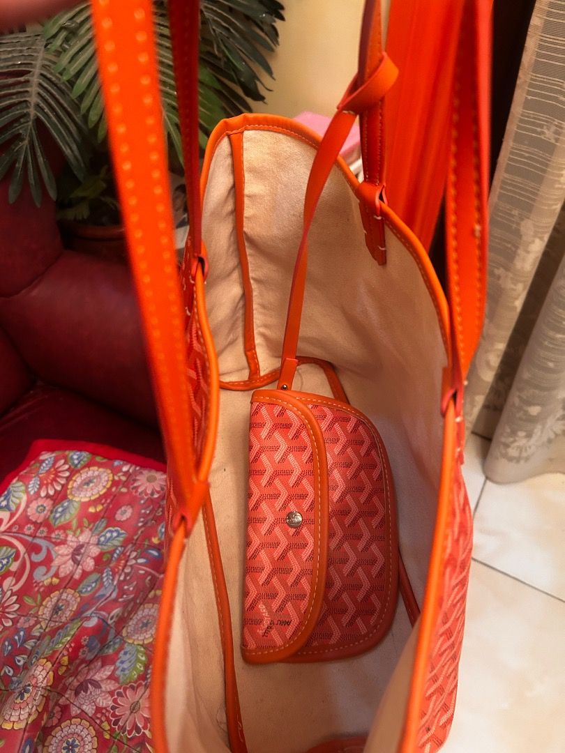 Goyard St Louis Tote Bag Orange (Category: Luxury Bags & Wallets) located in Caloocan City. Submitted by delutanaom52298 (Listing ID 1456533749, Image 2). Description: - Orange Goyard tote bag - Classic Goyardine monogram pattern - Comes with a matching interior pouch - Durable leather trim and handles - Spacious interior, perfect for everyday essentials or travel.