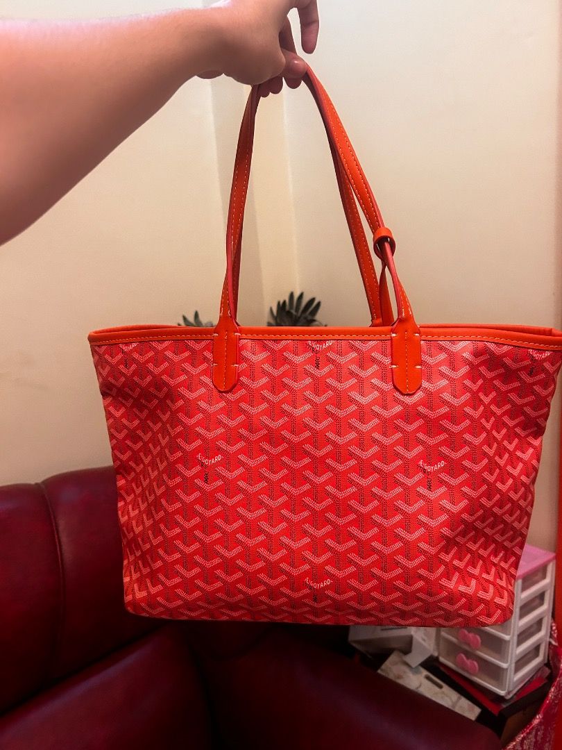 Goyard St Louis Tote Bag Orange (Category: Luxury Bags & Wallets) located in Caloocan City. Submitted by delutanaom52298 (Listing ID 1456533749, Image 3). Description: - Orange Goyard tote bag - Classic Goyardine monogram pattern - Comes with a matching interior pouch - Durable leather trim and handles - Spacious interior, perfect for everyday essentials or travel.