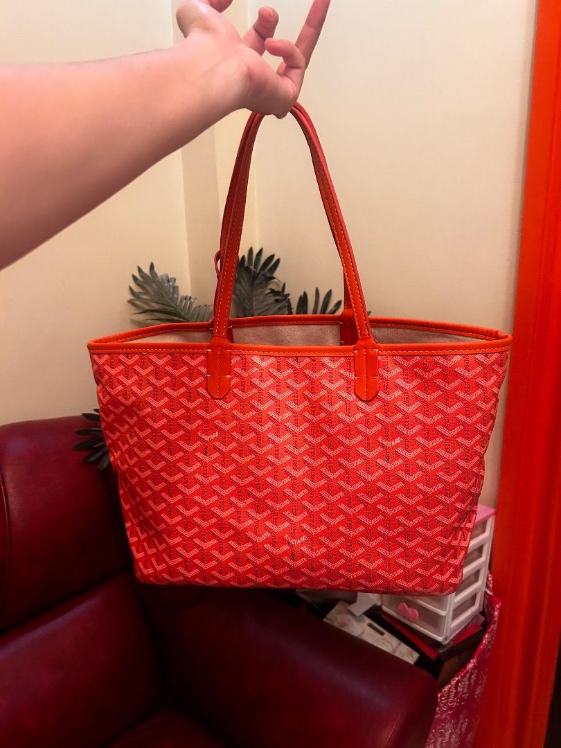 Goyard St Louis Tote Bag Orange (Category: Luxury Bags & Wallets) located in Caloocan City. Submitted by delutanaom52298 (Listing ID 1456533749, Image 1). Description: - Orange Goyard tote bag - Classic Goyardine monogram pattern - Comes with a matching interior pouch - Durable leather trim and handles - Spacious interior, perfect for everyday essentials or travel.