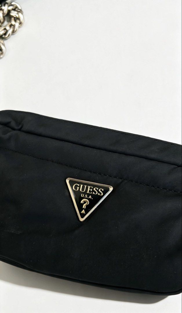 Guess Eco gemma camera cross body bag (Category: Cross-body Bags) located in Caloocan City. Submitted by mr.escobar (Listing ID 1456499933, Image 2). Description: This item is the Guess Eco Gemma Crossbody Camera Bag (or a similar variations from their nylon utility collections like the Guess Little Bay or Guess Sharma). It features a distinctive design heavily inspired by luxury multi-accessory utility pouches.