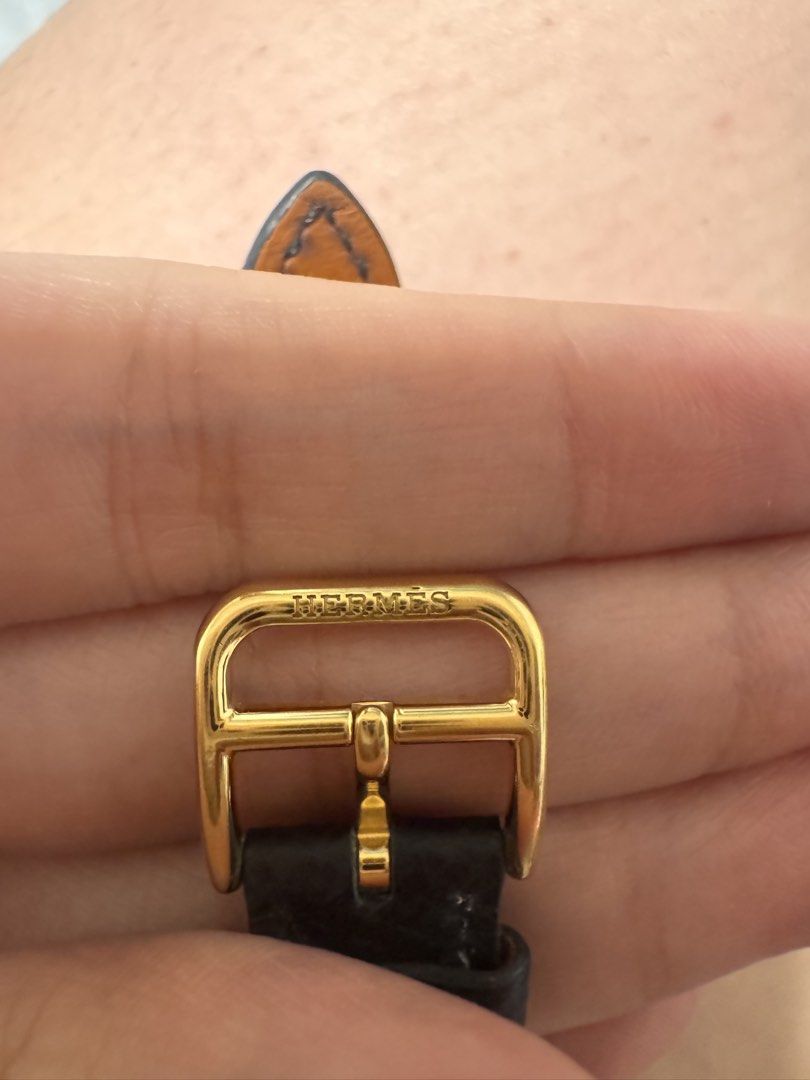 Hermes H Watch Gold Black Leather Strap (Category: Luxury Watches) located in San Jose. Submitted by jen10200 (Listing ID 1456586877, Image 2). Description: - Negotiable -Authentic Hermes H Hour watch - Gold plated case with white dial - Black leather strap with Hermes buckle - Iconic H design - Swiss made movement - Timeless and classic piece -Unit only - In perfect working condition.