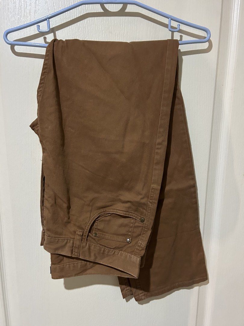 H&M Brown Chinos Pants size 34 US (Category: Chinos) located in Manila. Submitted by dal527 (Listing ID 1456589978, Image 1). Description: - Brand: H&M - Color: Brown - Size: EUR 34 / US 34 - Closure: Button fly - Pockets: Two front, two back - Origin: Made in Bangladesh - Style: Versatile for casual or smart-casual outfits.