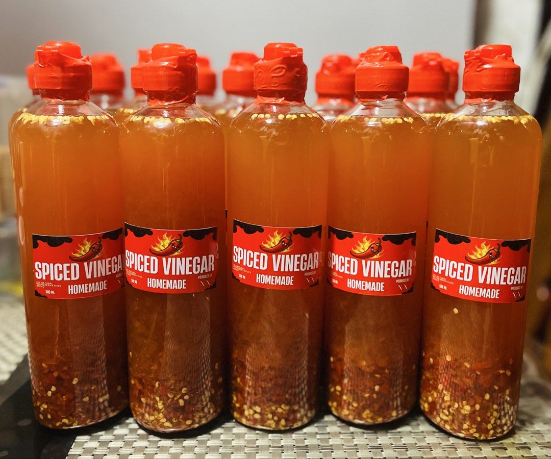 Homemade Spiced Vinegar - 500ml Bottles (Category: Spice & Seasoning) located in Valenzuela. Submitted by v_carla (Listing ID 1456531562, Image 1). Description: - Homemade Spiced Vinegar - 500ml bottle - Made with real chili flakes for an extra kick - Ideal for marinades, dipping sauces, and enhancing dishes.