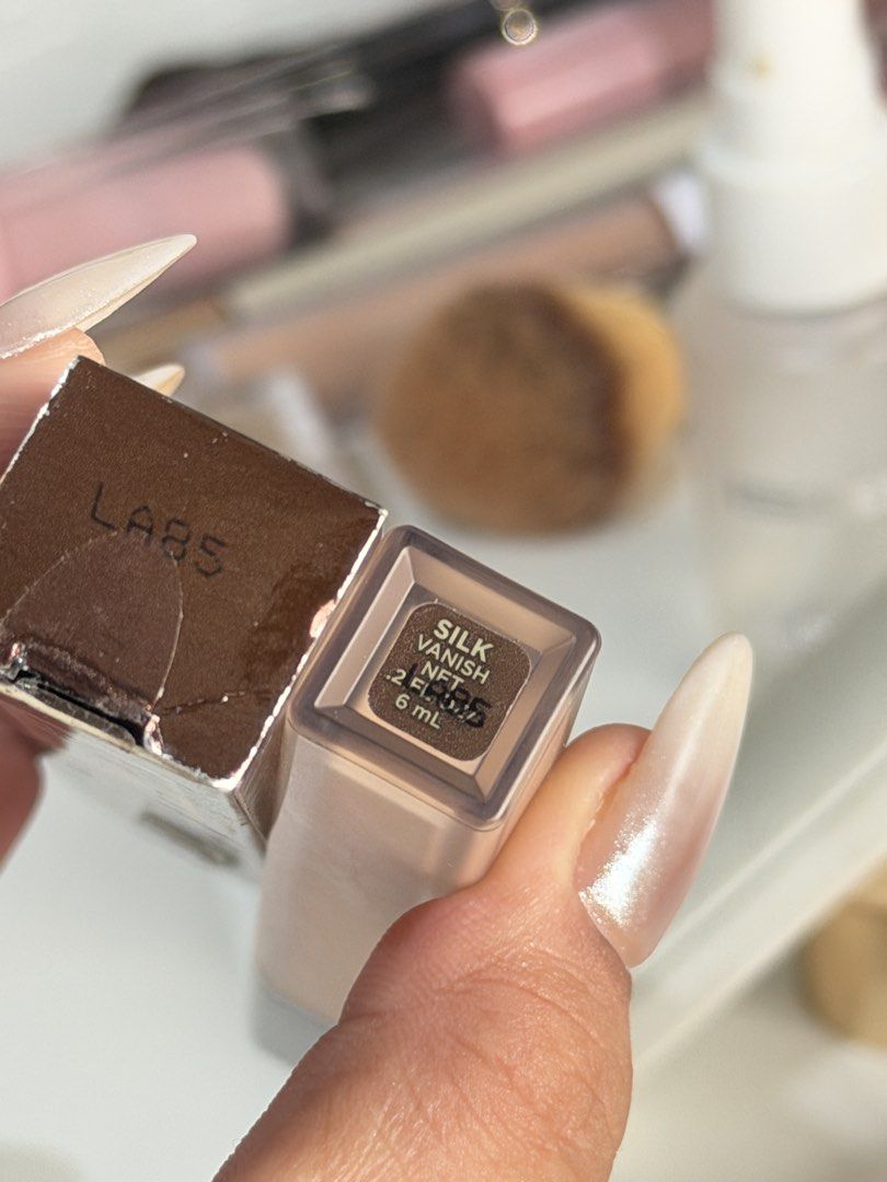 hourglass concealer shade silk (Category: Makeup) located in Manila. Submitted by frappiechin0 (Listing ID 1456440385, Image 3). Description: swatched once only wrong shade.
