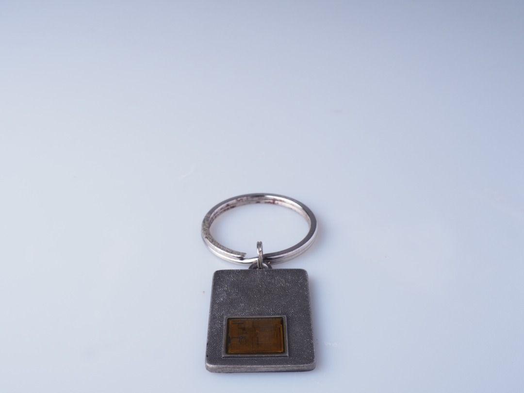 Intel Inside Pentium Processor Key Chain (Category: Computer Parts) located in Kepala Batas. Submitted by johnthamlc (Listing ID 1456433017, Image 2). Description: Intel Inside Pentium Processor Key Chain Actual Intel Pentium Processor Die Cover Removed, Seal it in a Steel Keychain The Processor is being coated with a layer of resin Conditions: Used The Key Ring Metal Part Rusting Scratch Packages: Intel Inside Pentium Processor Key Chain RM100 P