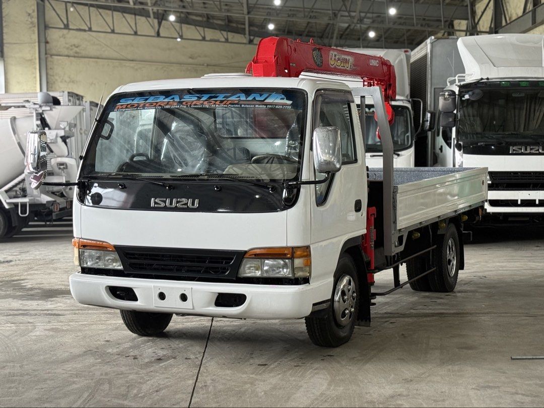 Isuzu Elf Boom truck 2.9tons 4section 4HF1 engine inline (Category: Heavy Vehicles) located in Bulacan. Submitted by arvin_custodio (Listing ID 1455328523, Image 3). Description: Isuzu Elf Boom truck 2.9Tons 4section 4HF1 engine inline Leafspring front/rear Complete docs Ready to pullout Call: 0919-096-9833.