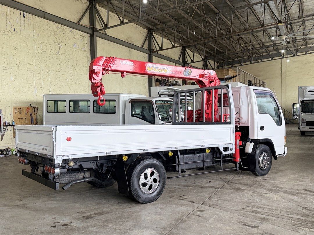Isuzu Elf Boom truck 2.9tons 4section 4HF1 engine inline (Category: Heavy Vehicles) located in Bulacan. Submitted by arvin_custodio (Listing ID 1455328523, Image 2). Description: Isuzu Elf Boom truck 2.9Tons 4section 4HF1 engine inline Leafspring front/rear Complete docs Ready to pullout Call: 0919-096-9833.