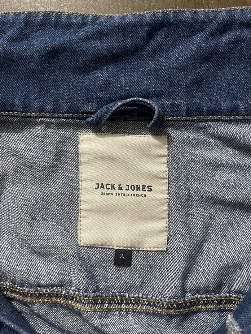 JACK & JONES Jeans Intelligence Denim Jacket XL (Category: Coats, Jackets and Outerwear) located in Manila. Submitted by elcidlai0233274 (Listing ID 1456479754, Image 2). Description: - Classic blue denim jacket - Brand: JACK & JONES - Size: XL - Distressed details on the front - Button closure - Two chest pockets - Ideal for layering Rfs: decluttering .