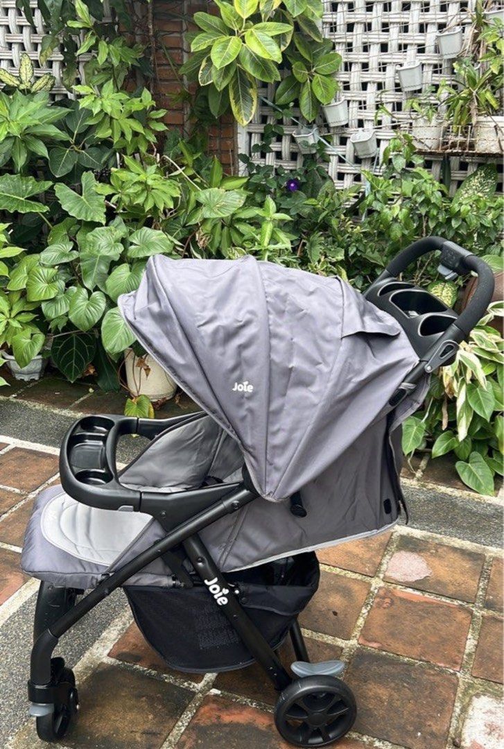 Joie Grey Baby Stroller (Category: Strollers) located in Del Monte. Submitted by shulamar (Listing ID 1456553022, Image 3). Description: - Grey Joie stroller - Includes canopy and tray - Convenient storage basket underneath - Easy to maneuver and push - Folds compactly for storage - Ideal for daily walks and errands.